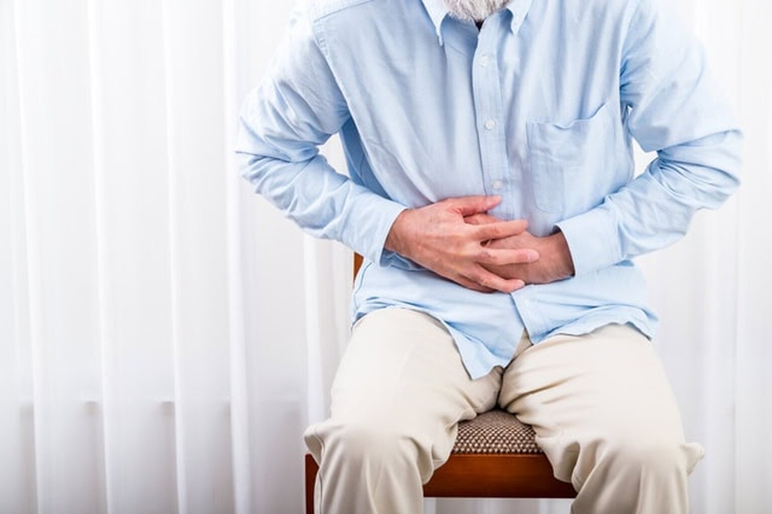 東京都豊島区大塚のおなかとおしりにクリニック 東京大塚の腹痛を訴える写真